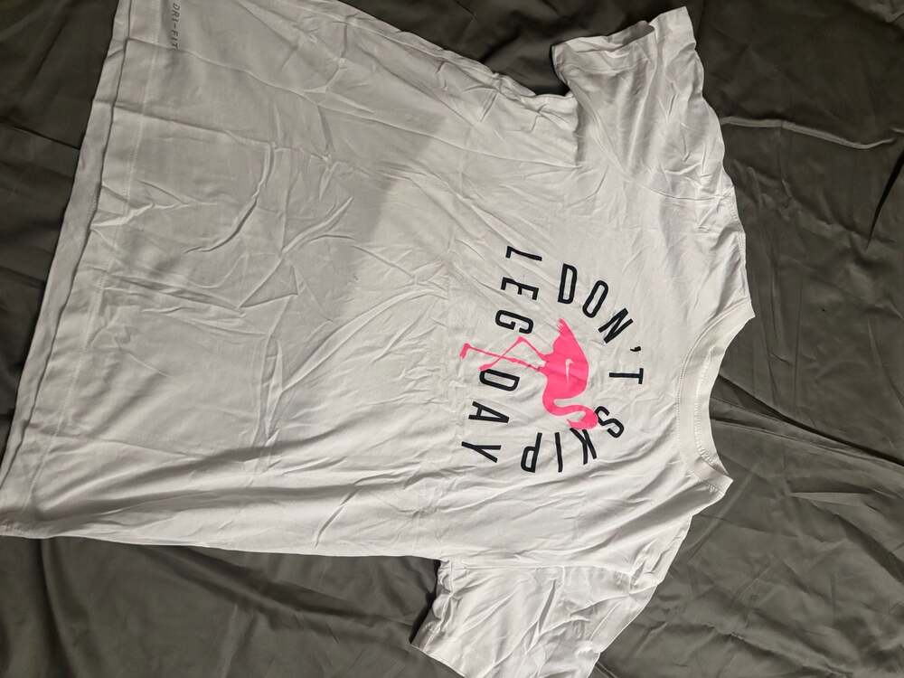 Nike Dri-FIT Men’s White Don't Skip Leg Day Flamingo Graphic‎ T-Shirt